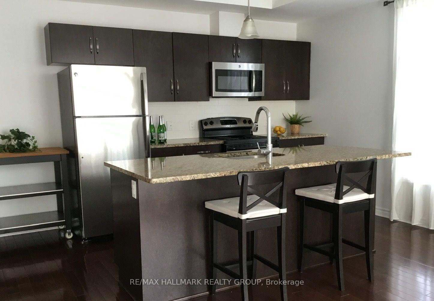 Photo 3 of Unit E, 861 Blackcomb Private, Ottawa, Elmvale Acres — HOMEH