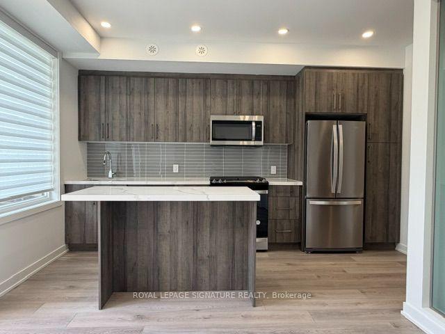 Photo 5 of Unit 2, 1475 O'Connor Drive, Toronto, O'Connor-Parkview — HOMEH