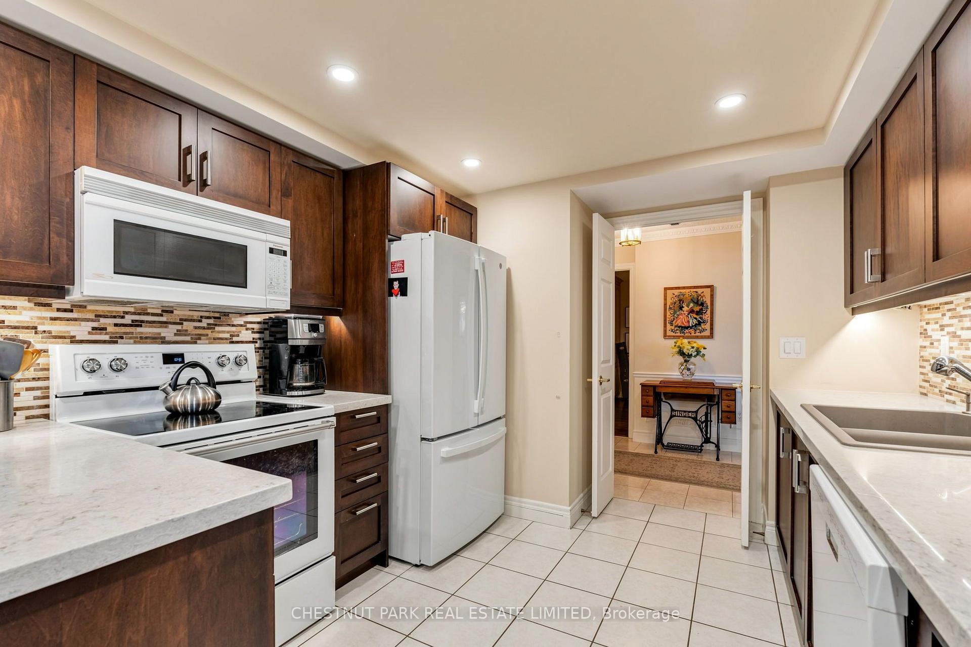 Photo 16 of Unit 713, 89 Skymark Drive, North York, Hillcrest Village — HOMEH
