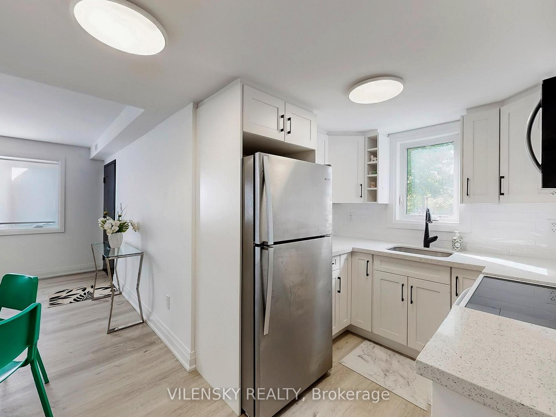 Photo 4 of Unit F, 195 Owen Street, Barrie, Wellington — HOMEH