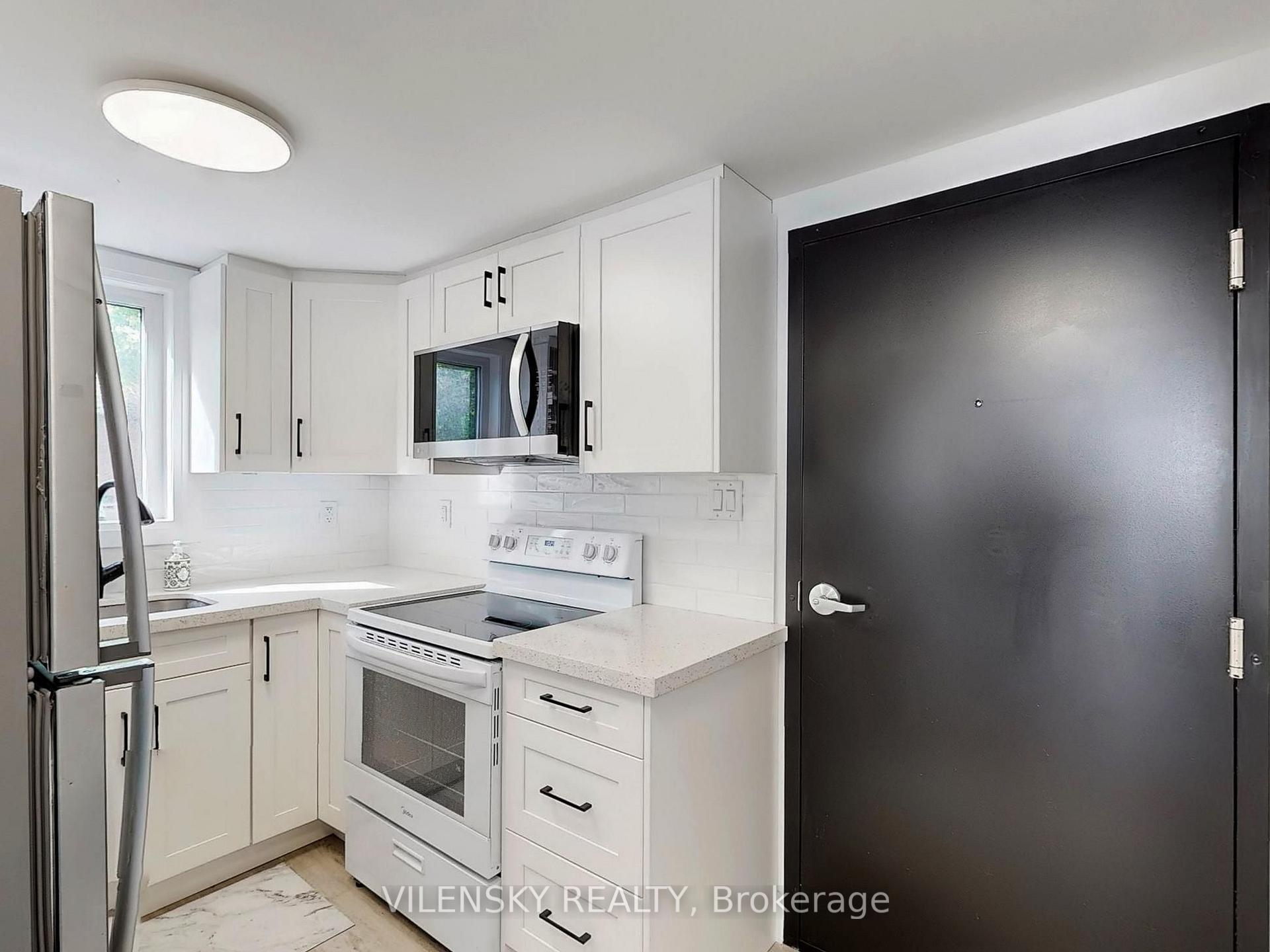 Photo 5 of Unit F, 195 Owen Street, Barrie, Wellington — HOMEH