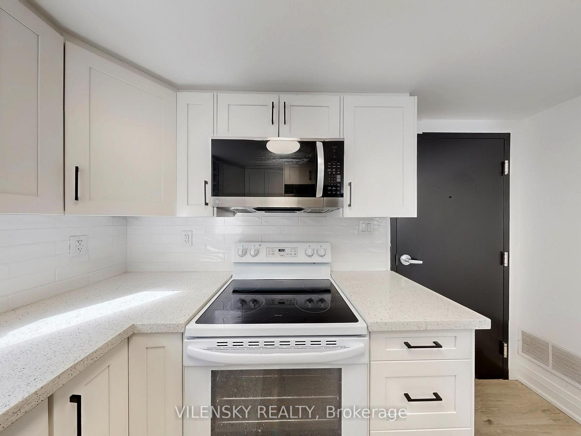 Photo 6 of Unit F, 195 Owen Street, Barrie, Wellington — HOMEH