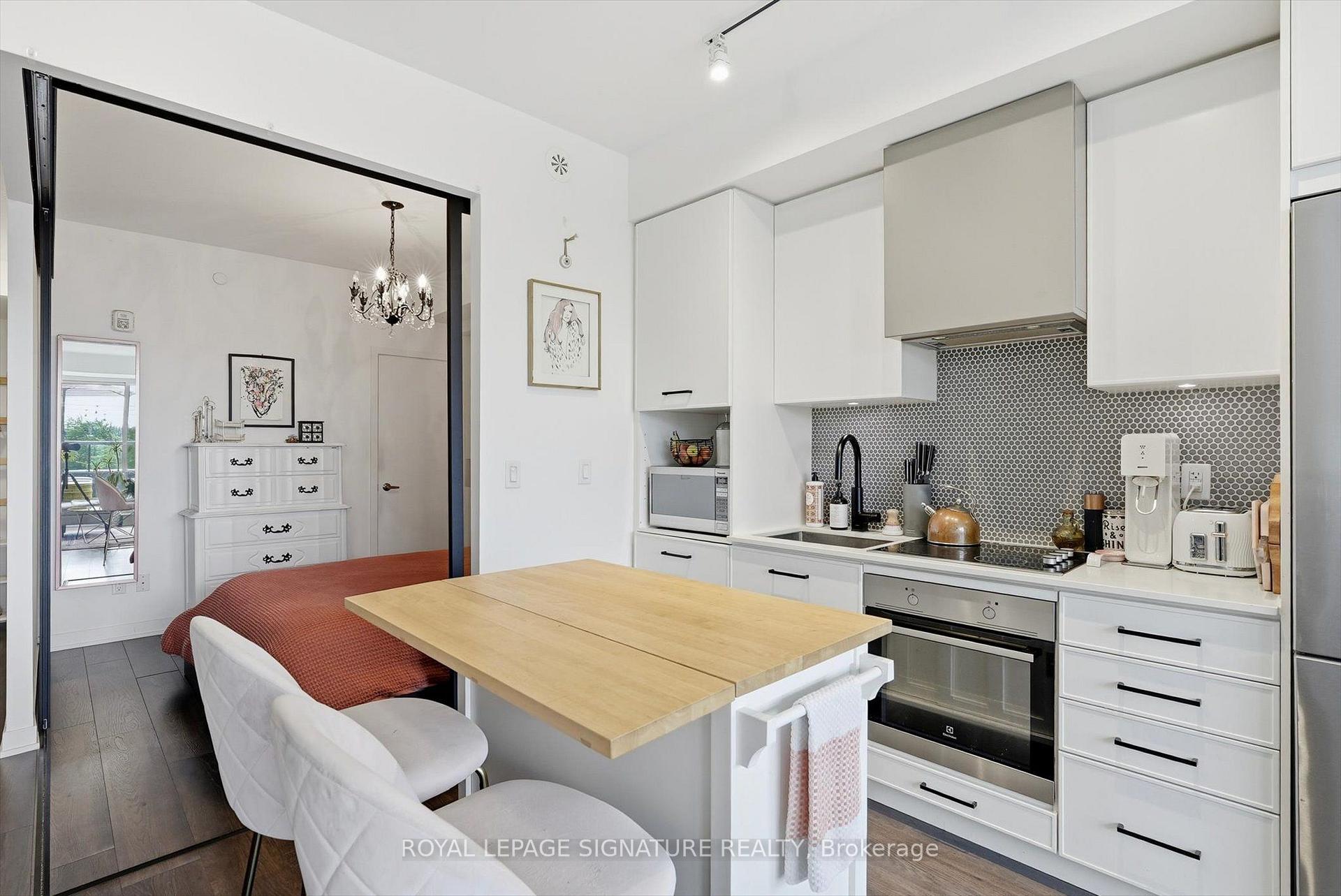 Photo 8 of Unit 503, 899 Queen Street E, Toronto, South Riverdale — HOMEH
