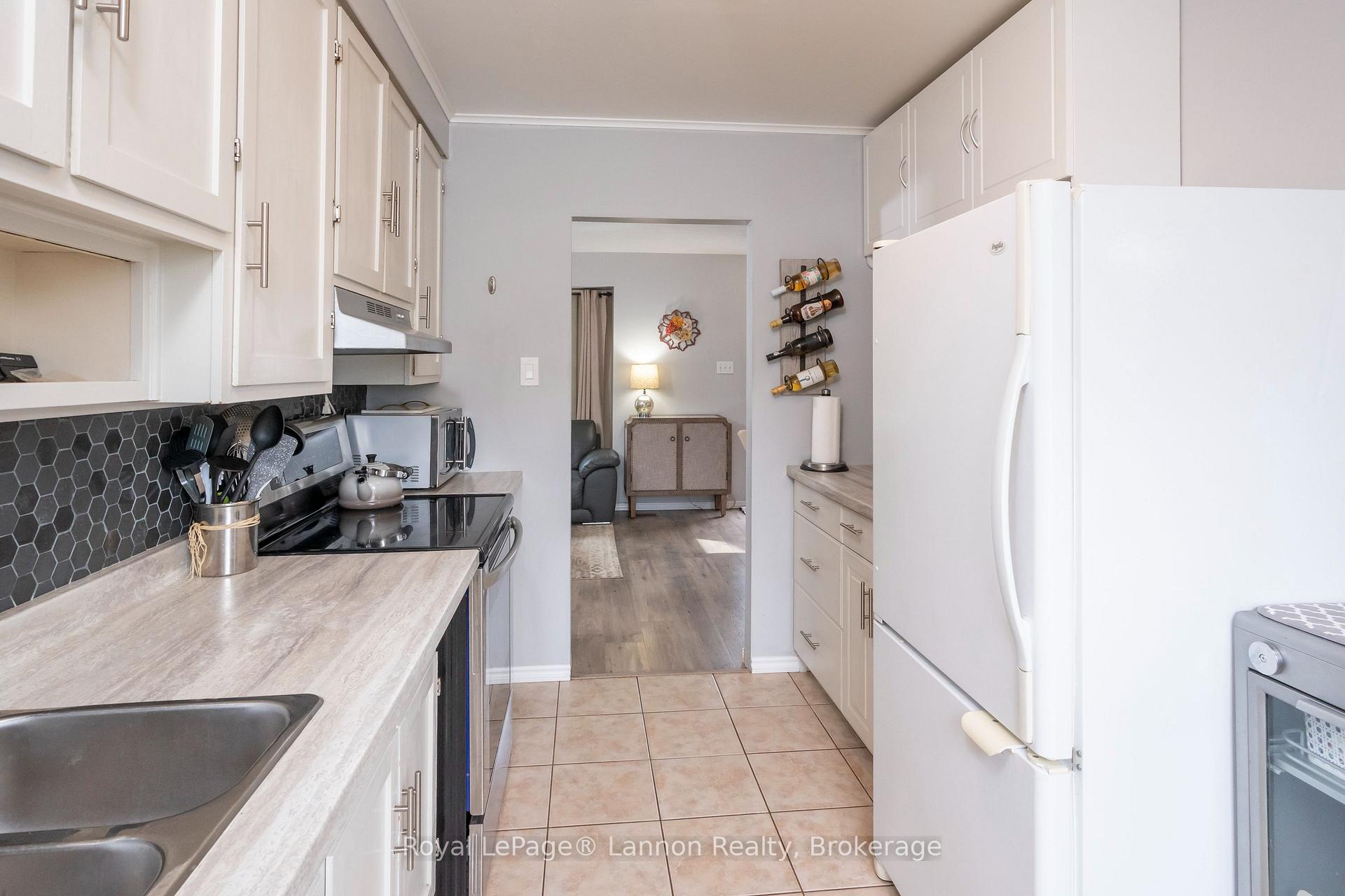 Photo 22 of 859 Syndicate Avenue N, Thunder Bay, McKeller Park — HOMEH