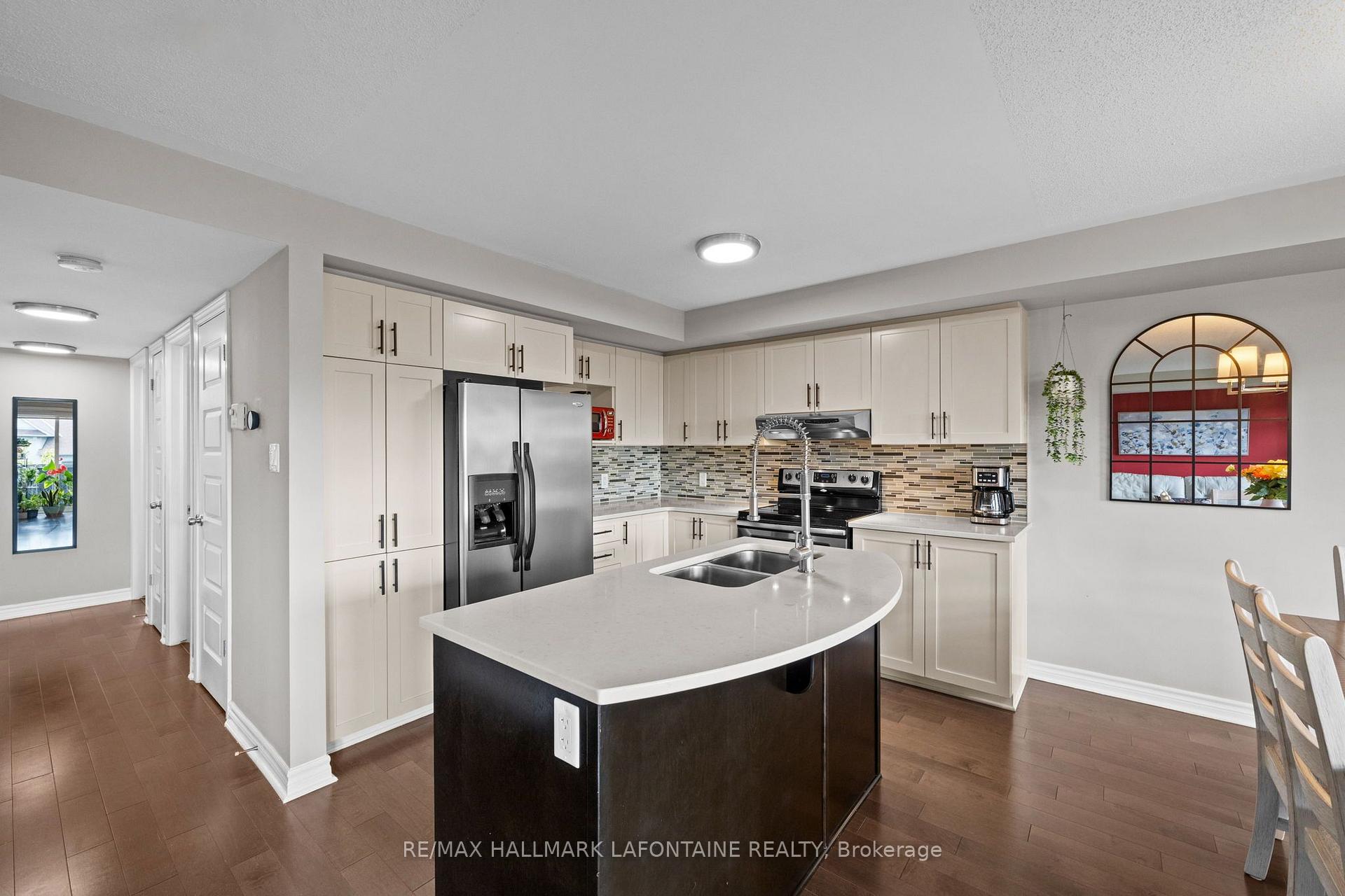Photo 5 of Unit 7, 585 Stonefield Private, Ottawa, Barrhaven East — HOMEH