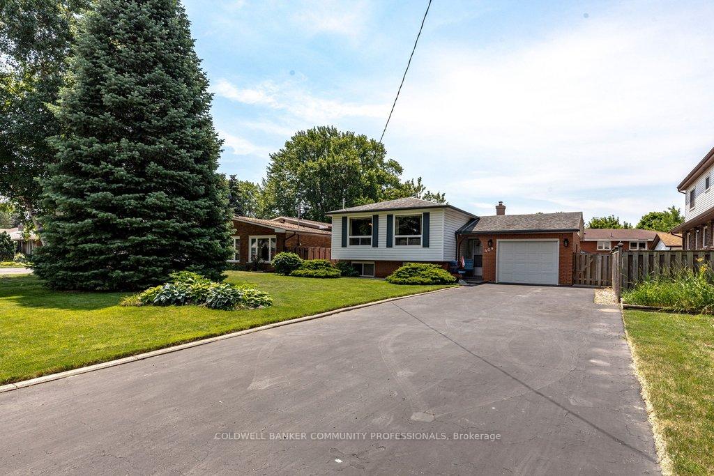 Photo 2 of 409 Mohawk Road W, Hamilton, Rolston — HOMEH