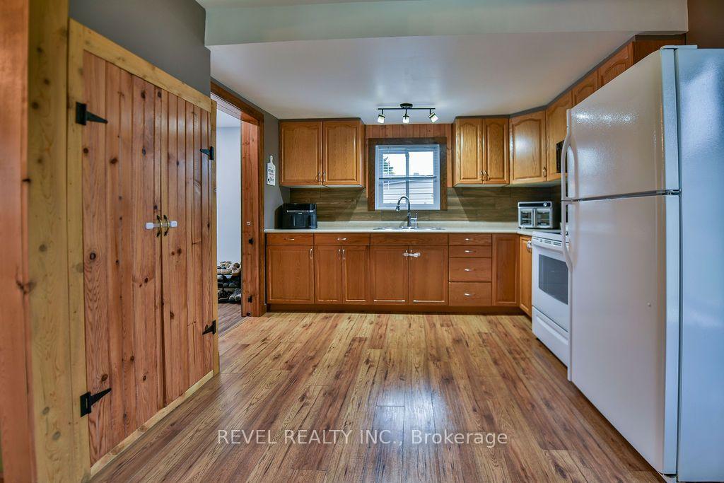 Photo 9 of 583 Maclean Drive, Timmins, TNW - Upper Melrose — HOMEH