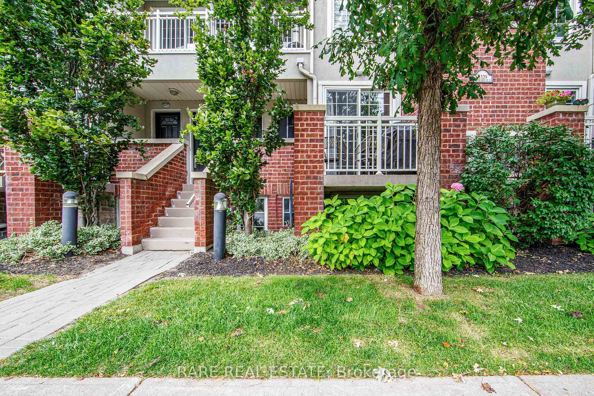 Photo 1 of Unit 104, 2320 Gerrard Street E, Toronto, East End-Danforth — HOMEH