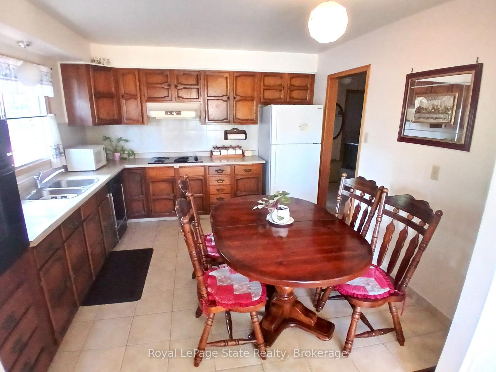 Photo 10 of 118 Craigroyston Road, Hamilton, Glenview — HOMEH