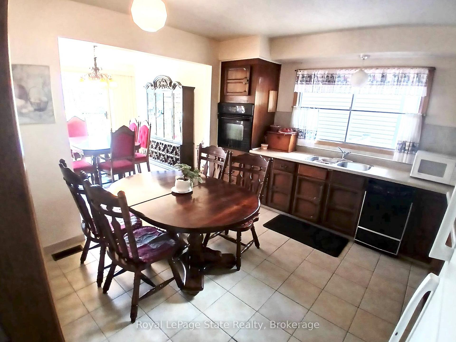 Photo 11 of 118 Craigroyston Road, Hamilton, Glenview — HOMEH
