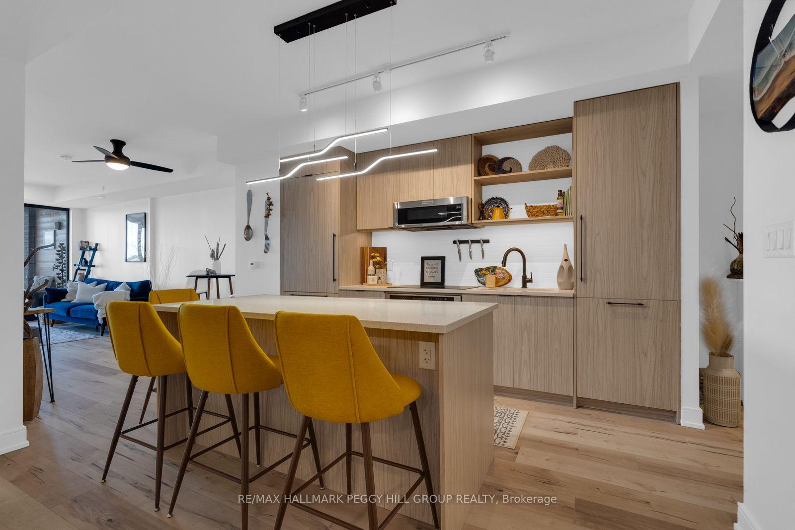 Photo 6 of Unit 305, 185 Dunlop Street E, Barrie, Lakeshore — HOMEH