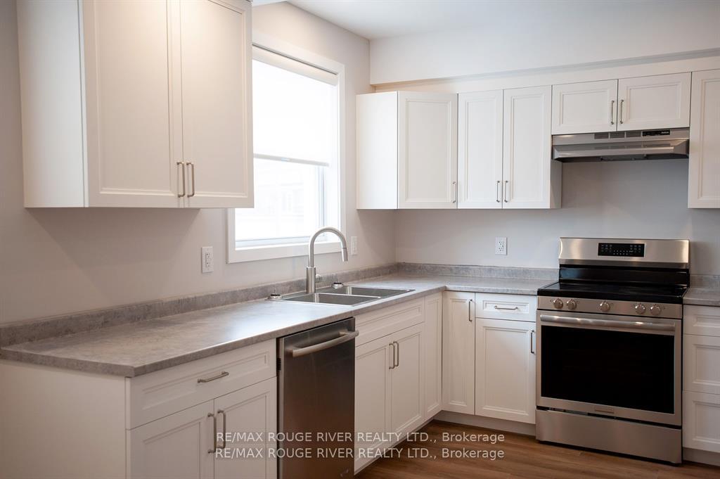 Photo 2 of Unit C, 201 Division Street, Cobourg — HOMEH