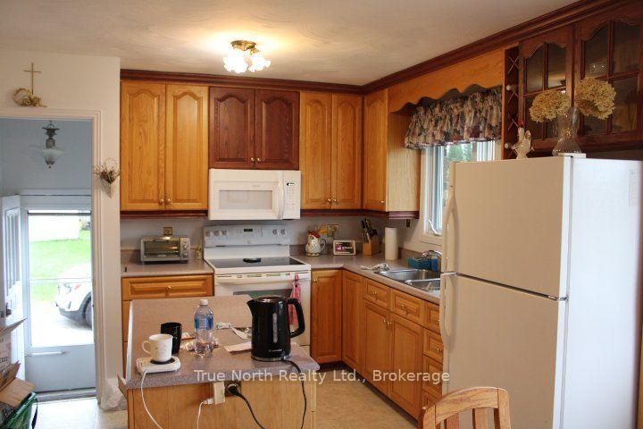 Photo 3 of 286 Government Road N, Kapuskasing — HOMEH