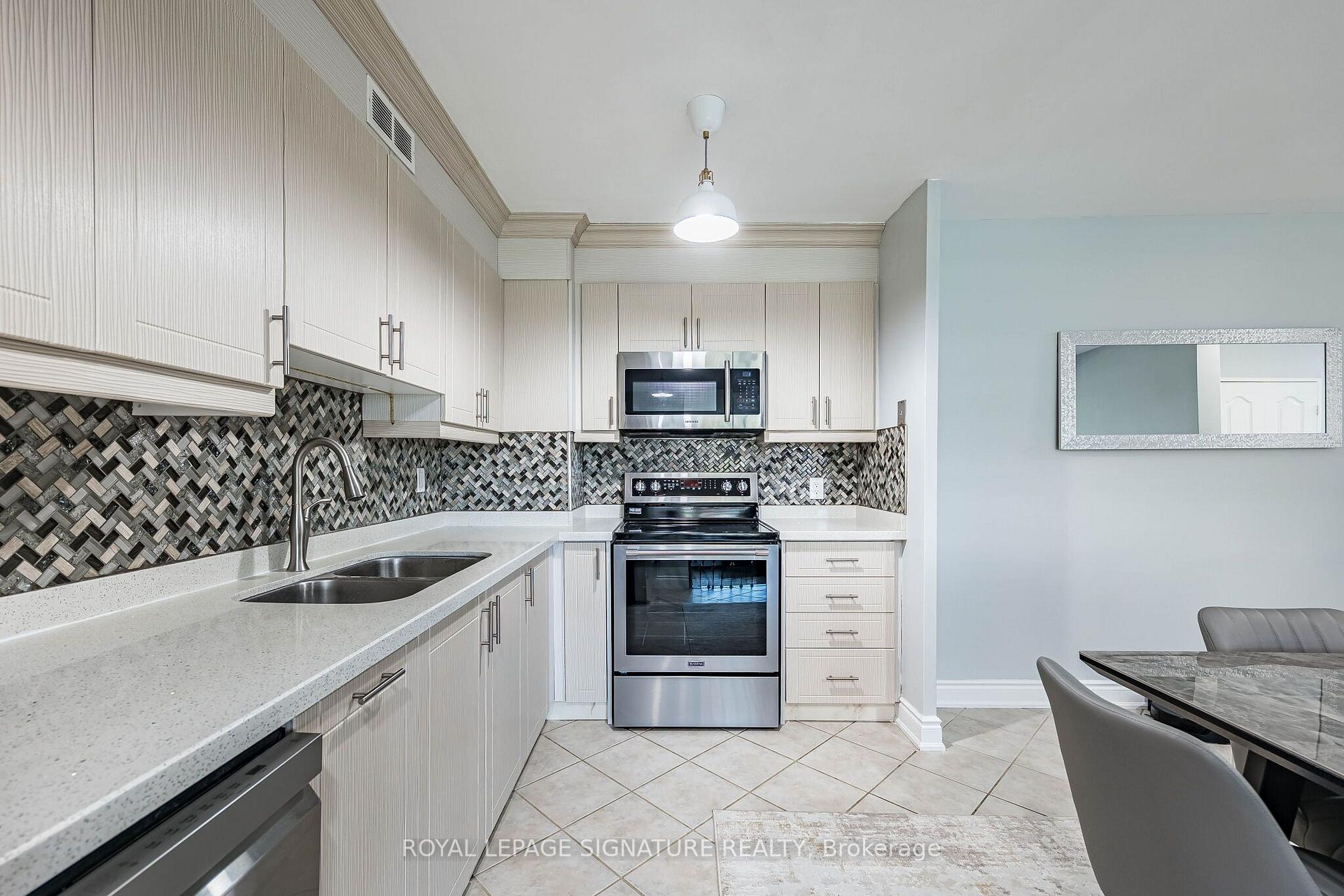 Photo 8 of Unit 405, 25 Four Winds Drive, North York, York University Heights — HOMEH