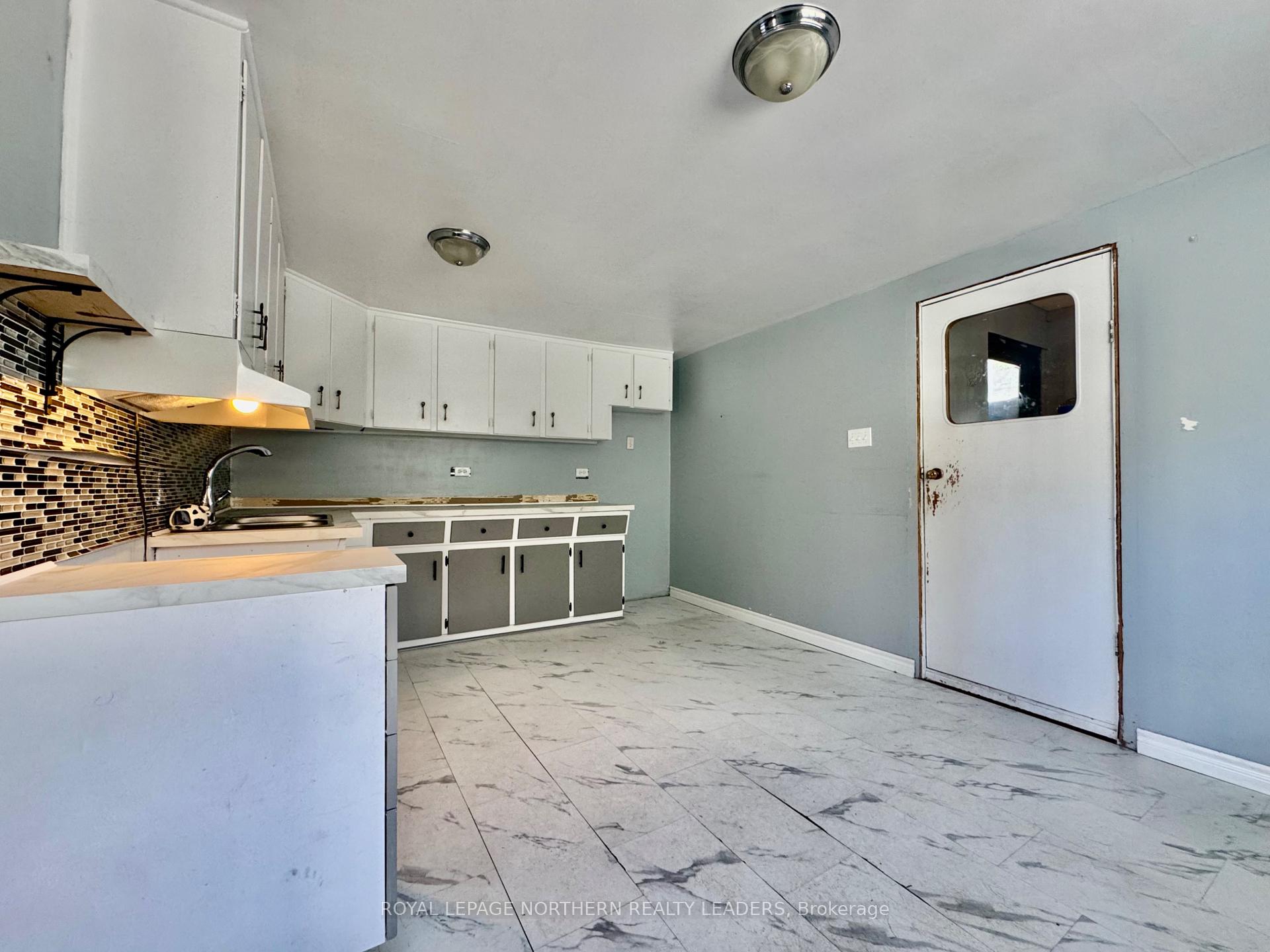 Photo 8 of 80 Fourth Avenue, Timmins, SCH - Main Area — HOMEH