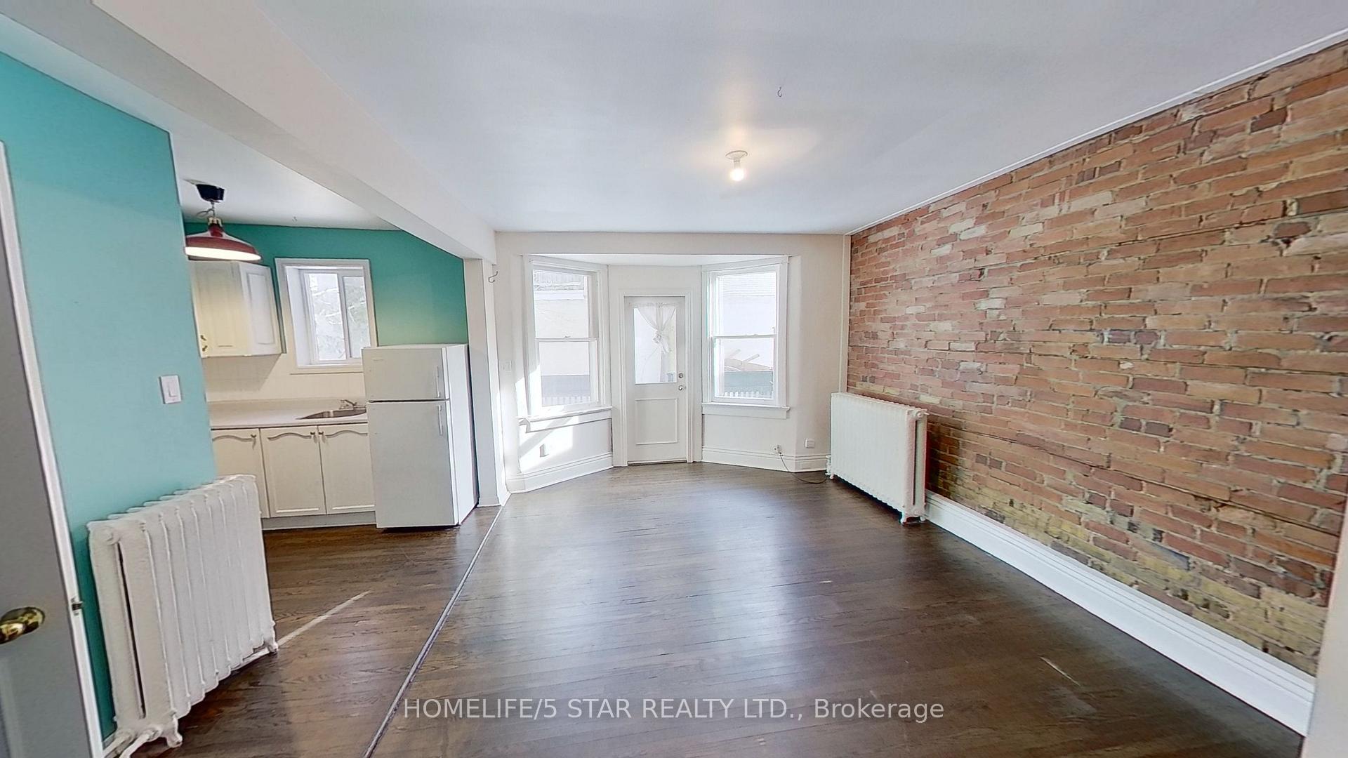 Photo 2 of Unit Main Back Apt, 113 Rusholme Road, Toronto, Dufferin Grove — HOMEH