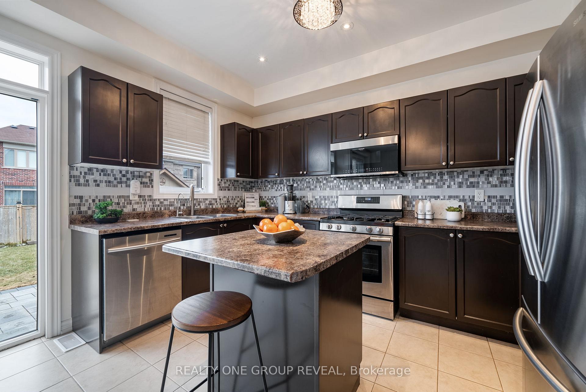 Photo 12 of 67 Buxton Lane, Clarington, Bowmanville — HOMEH