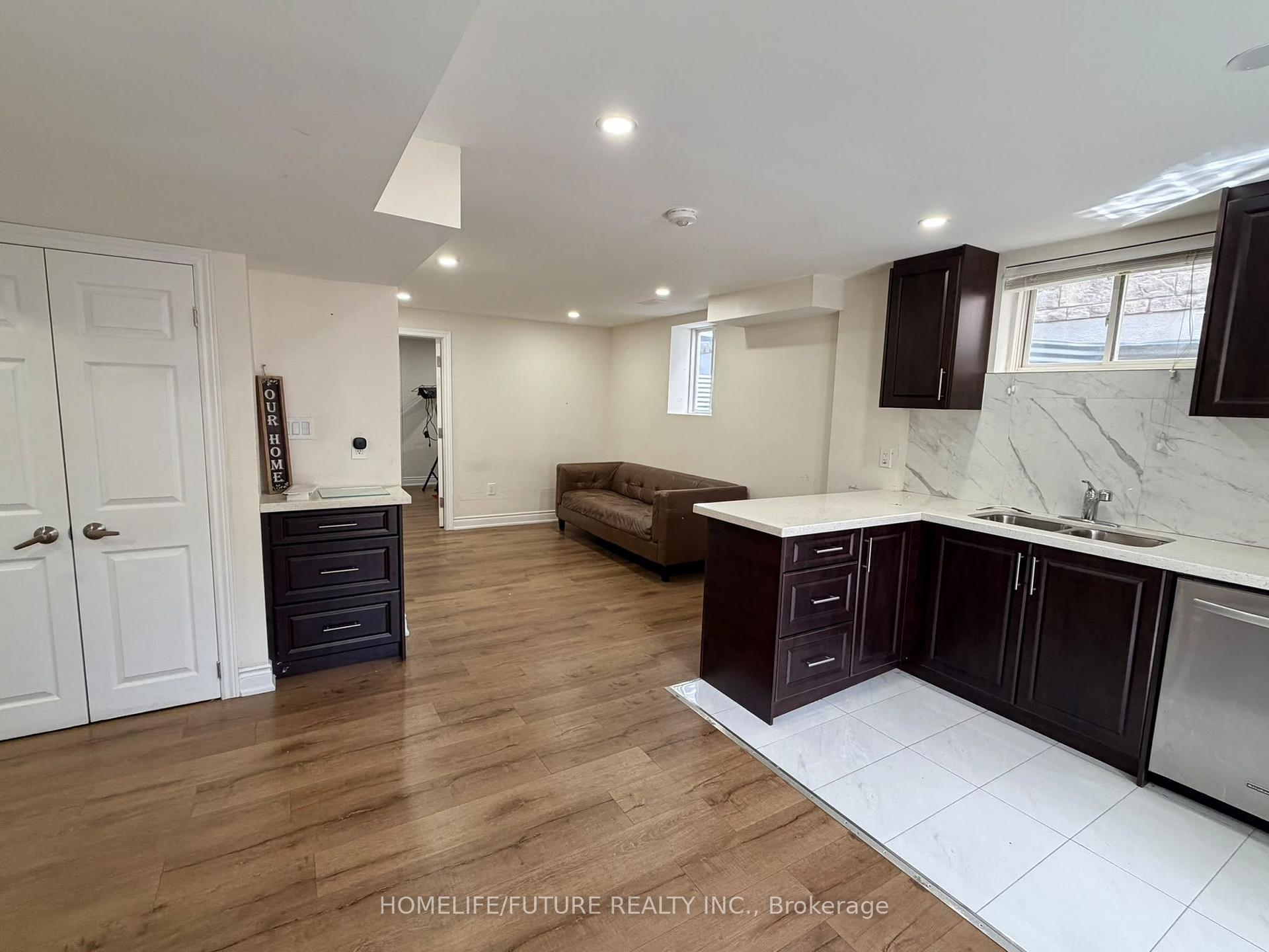 Photo 2 of Unit Bsmt, 61 Wideman Boulevard, Guelph, Victoria North — HOMEH