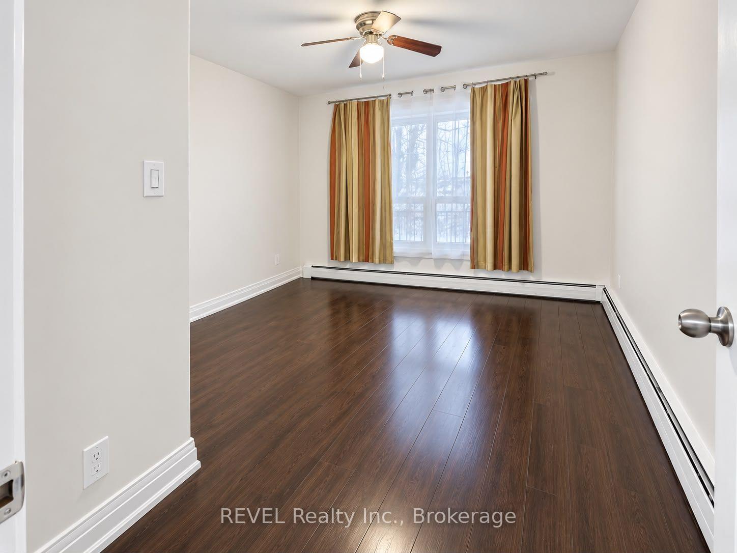 Photo 5 of Unit 1, 5459 Ontario Avenue, Niagara Falls, Downtown — HOMEH