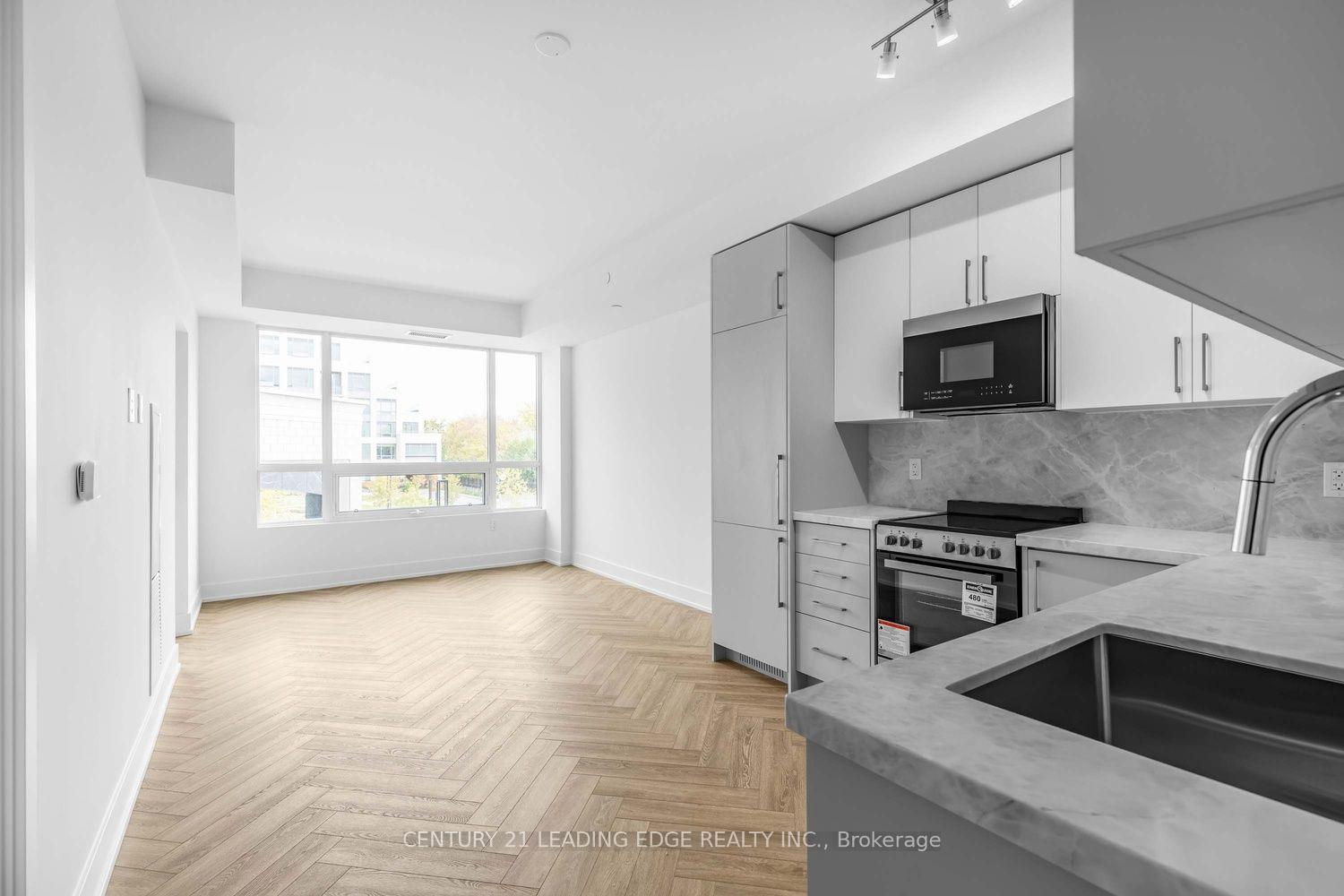 Photo 4 of Unit 214, 2075 King Road, King, King City — HOMEH