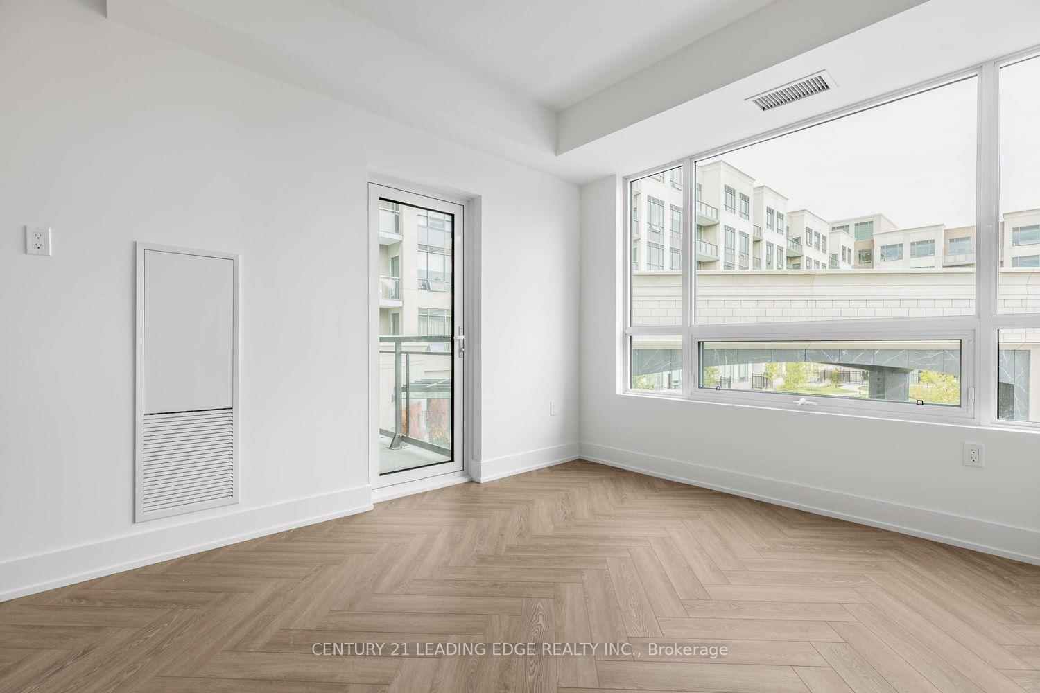 Photo 5 of Unit 214, 2075 King Road, King, King City — HOMEH