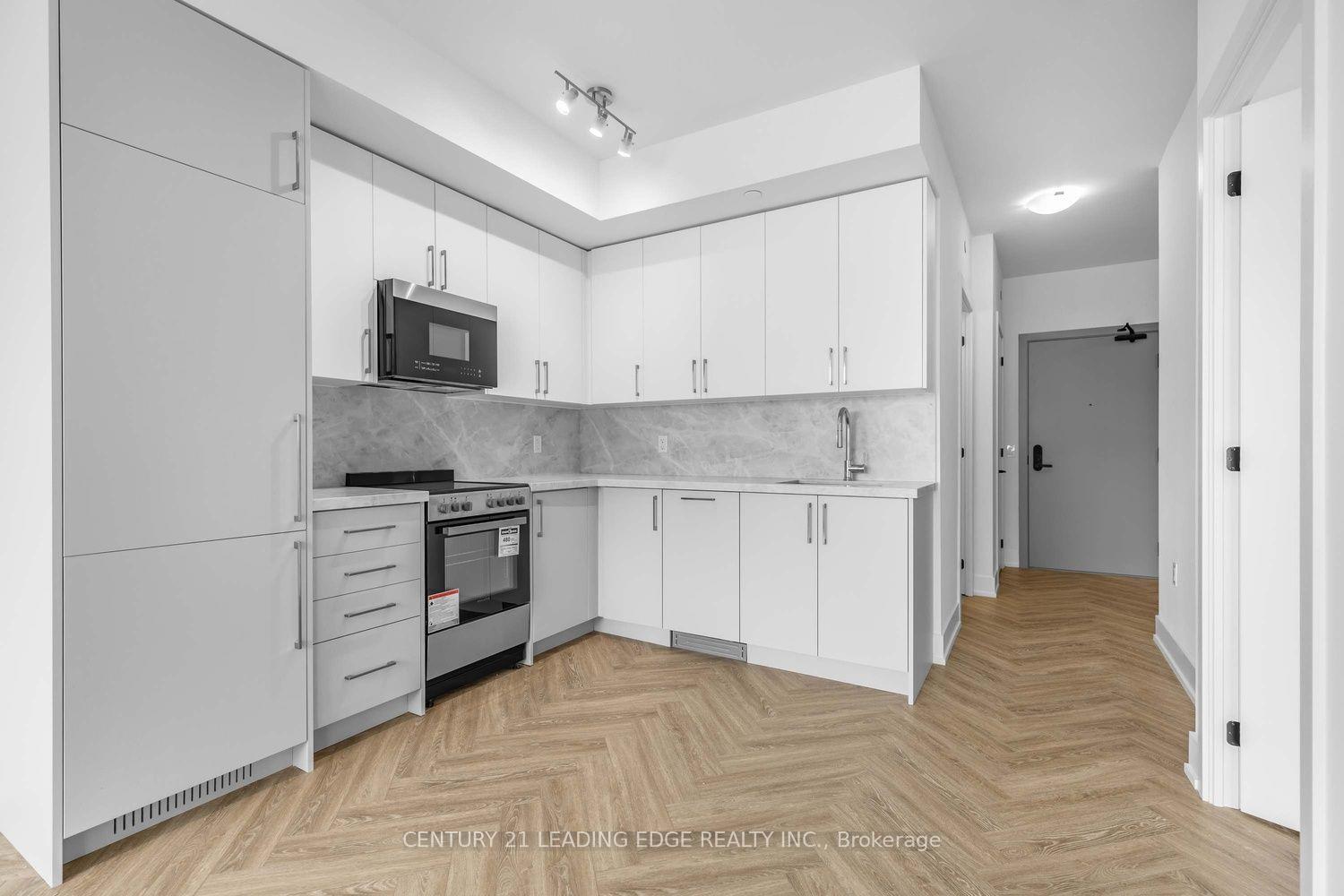 Photo 8 of Unit 214, 2075 King Road, King, King City — HOMEH