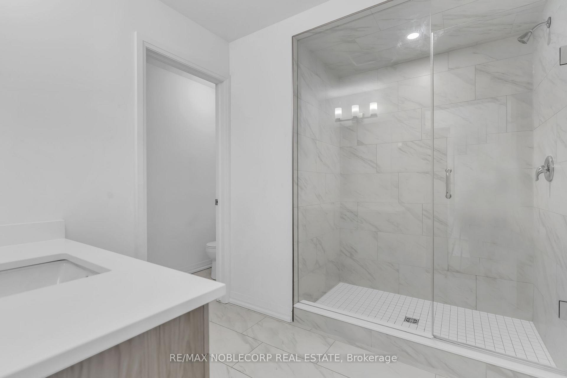 Photo 18 of 7396 Matteo Drive, Niagara Falls, Brown — HOMEH