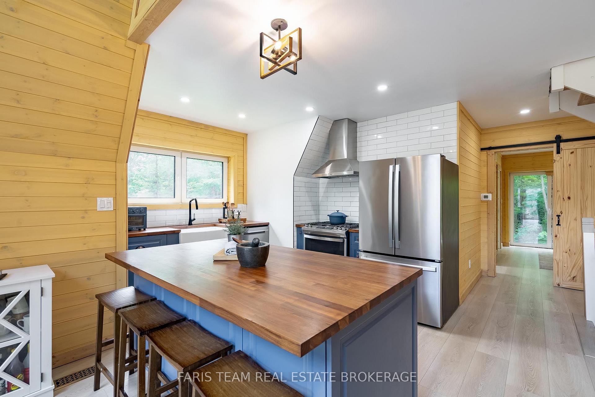 Photo 4 of 1490 Champlain Road, Tiny, Rural Tiny — HOMEH