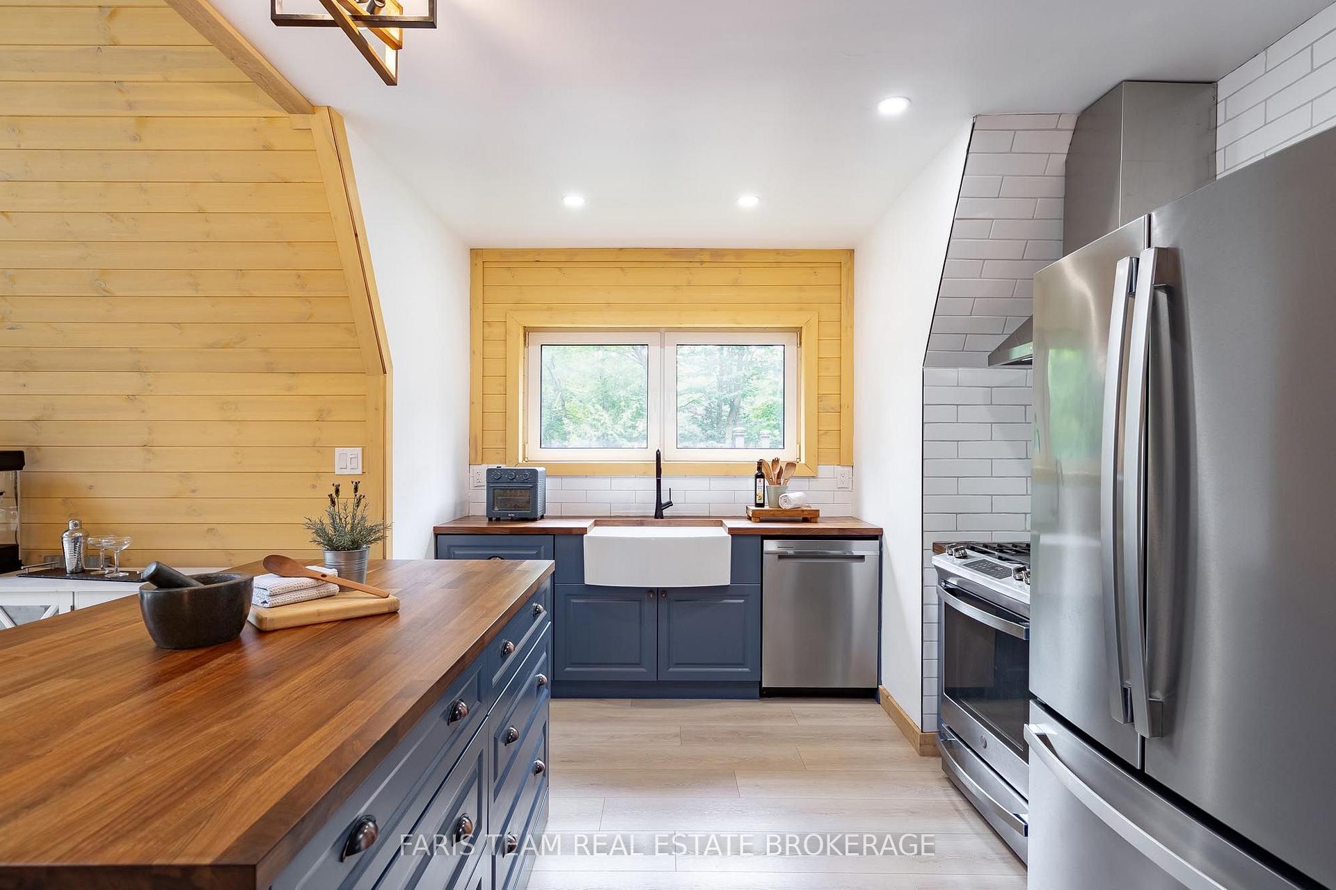 Photo 6 of 1490 Champlain Road, Tiny, Rural Tiny — HOMEH