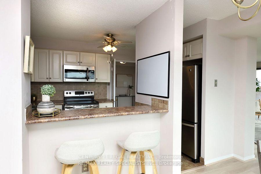 Photo 3 of Unit 704, 2155 Burnhamthorpe Road W, Mississauga, Erin Mills — HOMEH