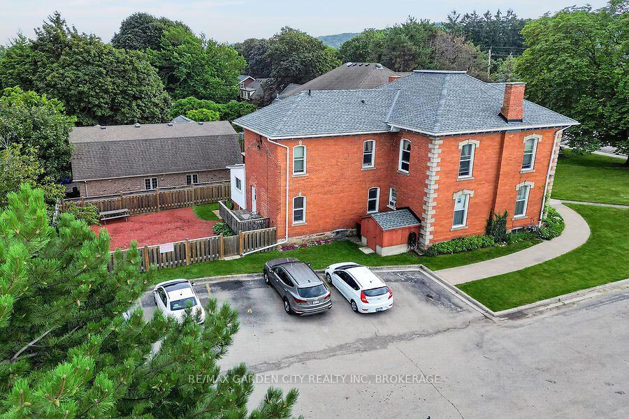 Photo 3 of 91 Main Street E, Grimsby, Grimsby East — HOMEH