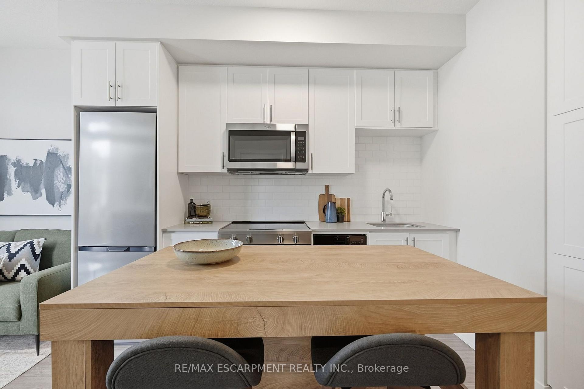 Photo 11 of Unit 134, 2500 Saw Whet Boulevard, Oakville, Glen Abbey — HOMEH
