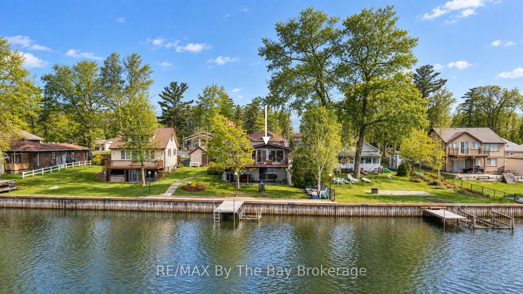 Photo 2 of 39 Old Mosley Street, Wasaga Beach — HOMEH