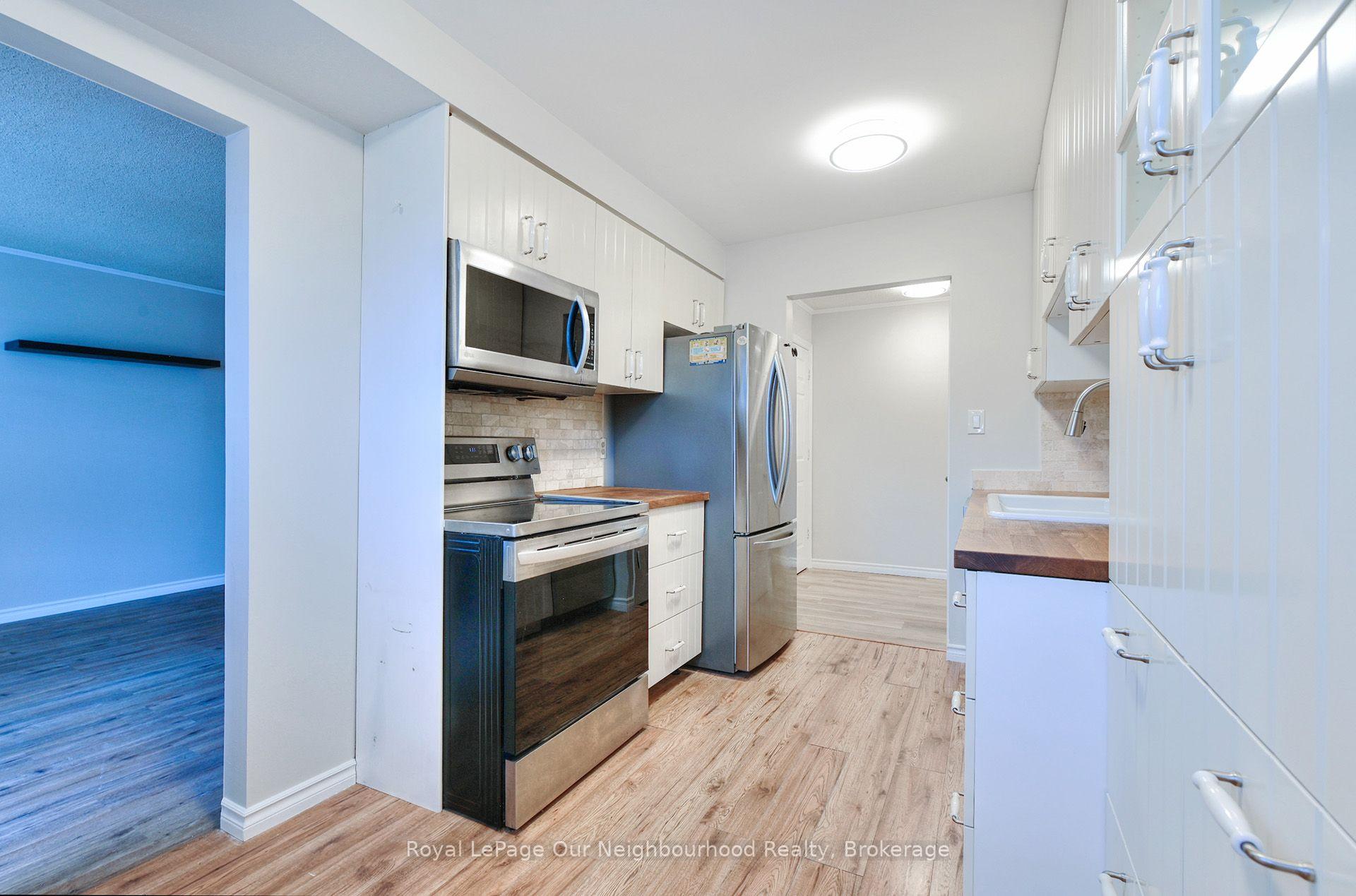 Photo 4 of Unit 34, 120 Nonquon Road, Oshawa, Centennial — HOMEH