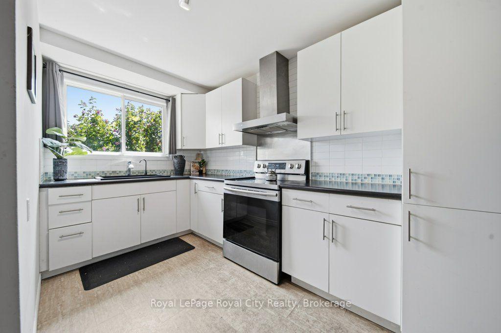 Photo 1 of Unit 31, 35 Rhonda Road, Guelph, Willow West/Sugarbush/West Acres — HOMEH