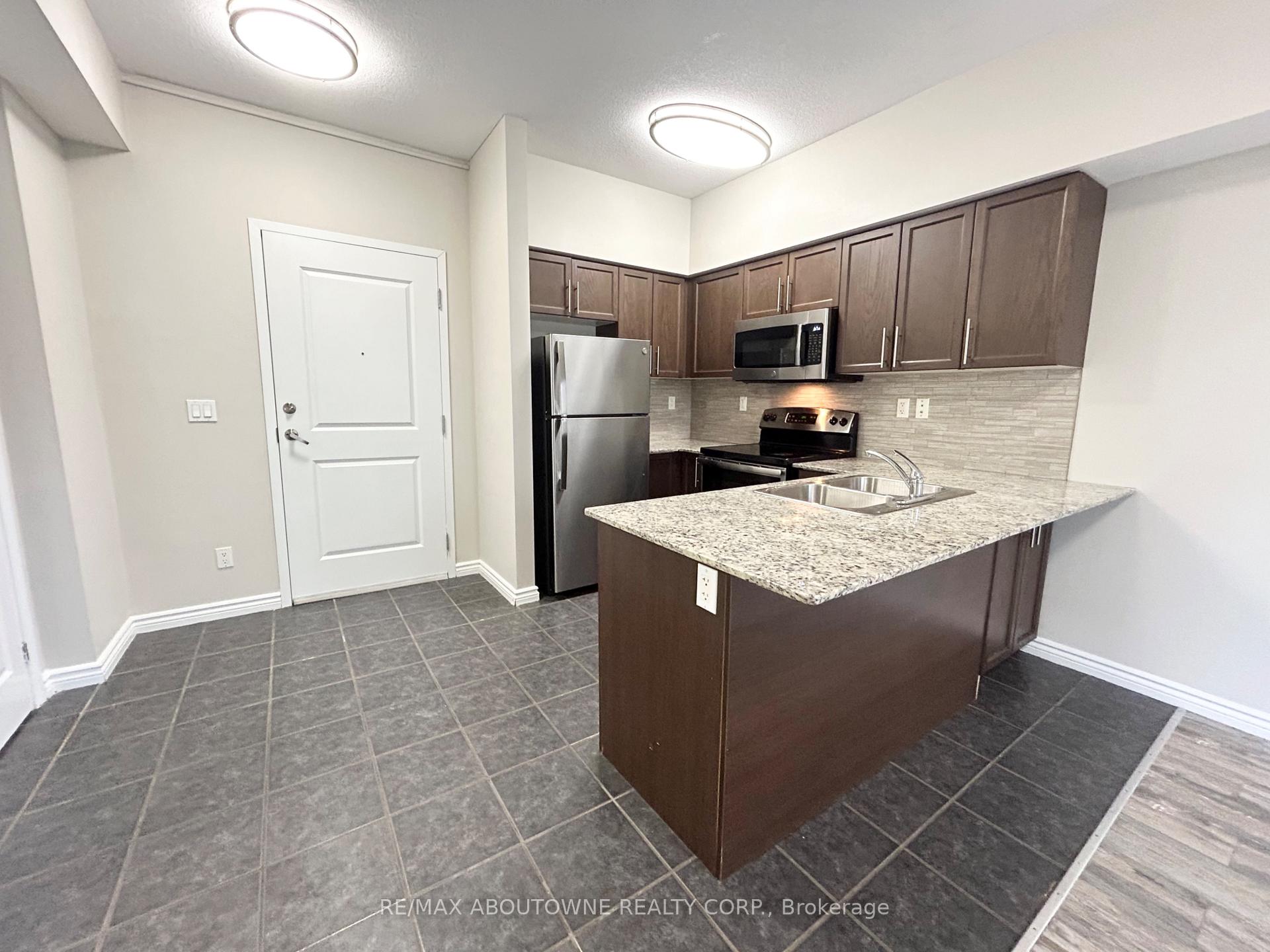 Photo 2 of Unit 102, 5 Rittenhouse Road, Kitchener, Country Hills West — HOMEH