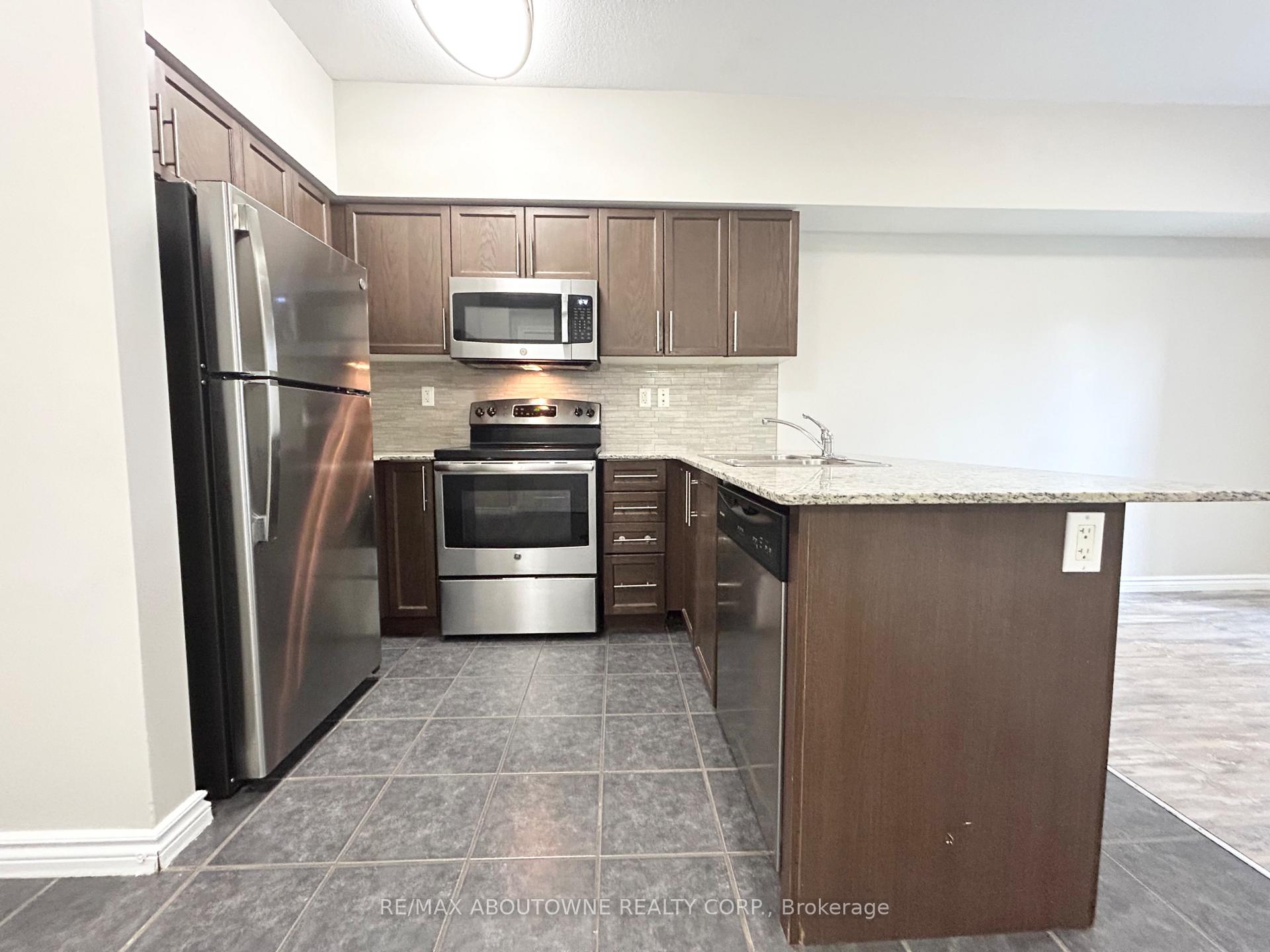Photo 3 of Unit 102, 5 Rittenhouse Road, Kitchener, Country Hills West — HOMEH