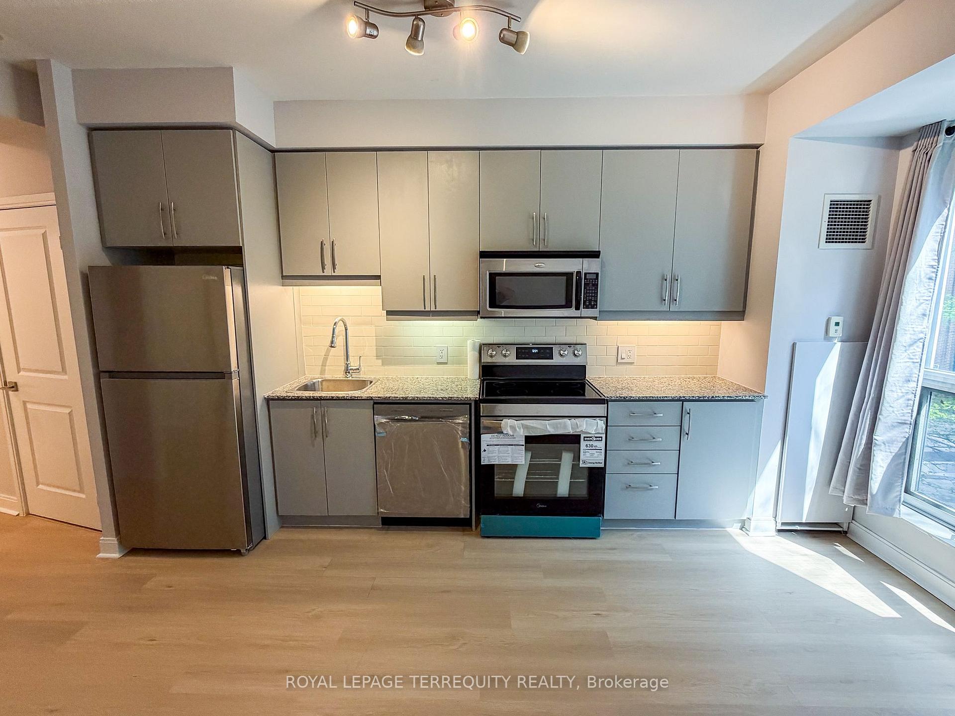 Photo 1 of Unit 311, 1 Scott Street, Toronto, Waterfront Communities — HOMEH