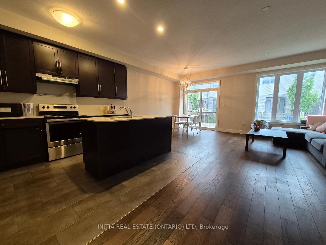 Photo 3 of Unit 109, 1960 Dalmagarry Road, London, North E — HOMEH