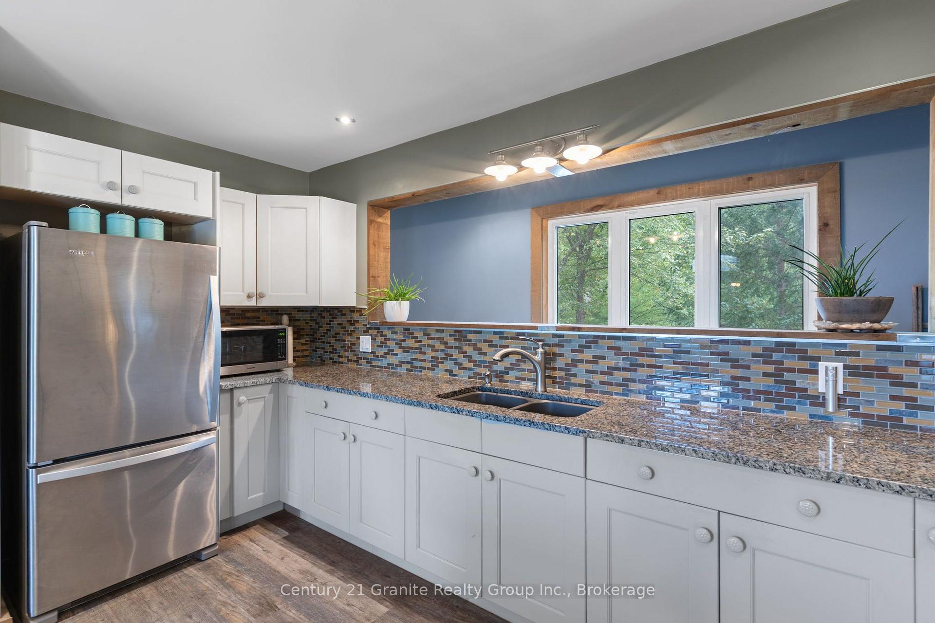 Photo 12 of 58 Winchester Drive, Kawartha Lakes, Somerville — HOMEH