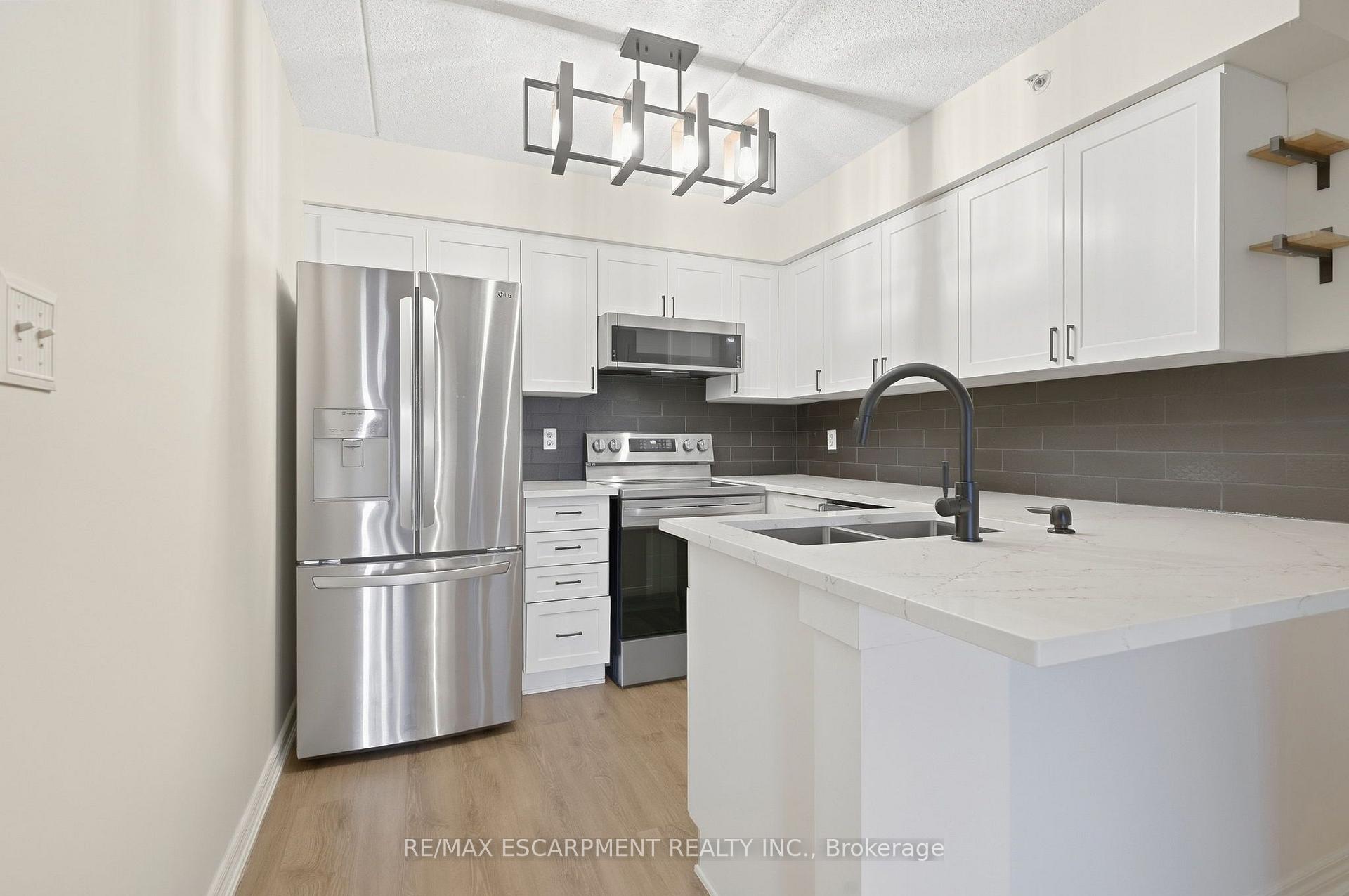Photo 10 of Unit 306, 2055 Appleby Line, Burlington, Uptown — HOMEH