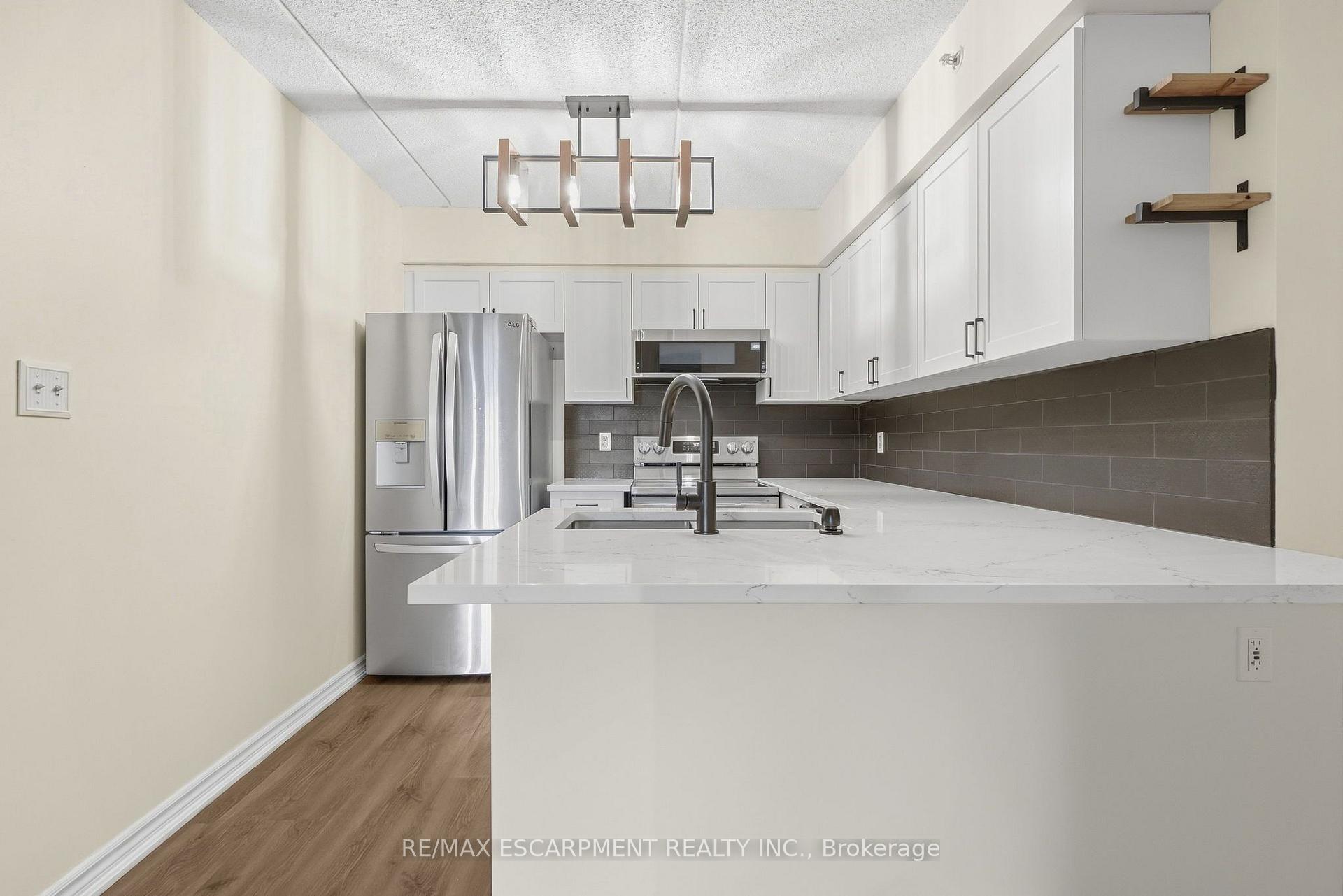 Photo 11 of Unit 306, 2055 Appleby Line, Burlington, Uptown — HOMEH