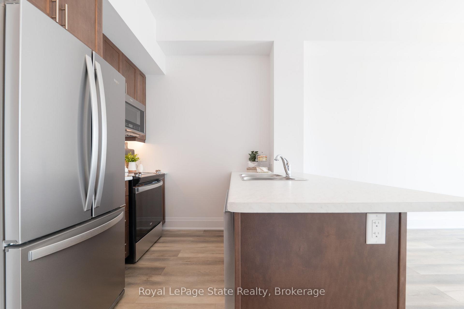 Photo 4 of Unit 413, 470 Dundas Street E, Hamilton, Waterdown — HOMEH