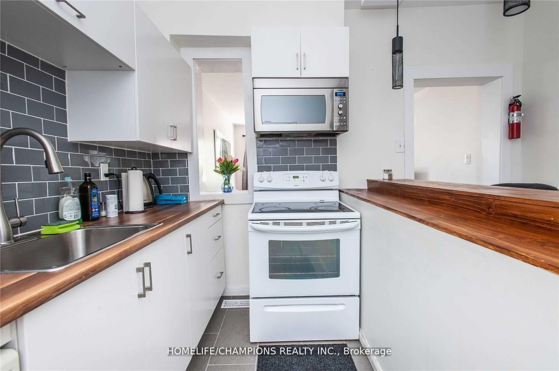 Photo 5 of 106 Lamb Avenue, Toronto, Greenwood-Coxwell — HOMEH