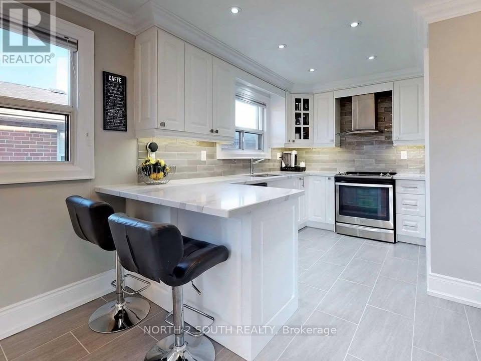 Photo 7 of Unit Main, 96 Bamford Crescent, North York, Black Creek — HOMEH
