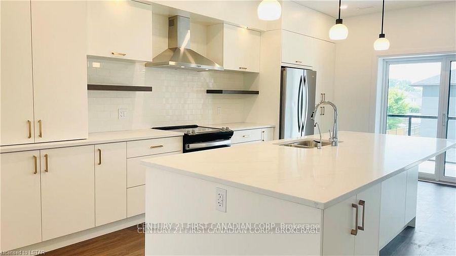 Photo 5 of Unit 104, 361 Quarter Town Line, Tillsonburg — HOMEH