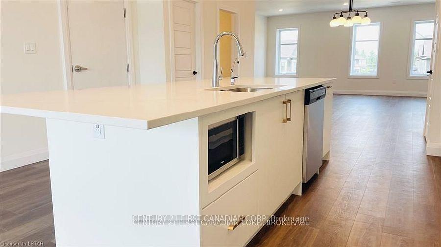 Photo 10 of Unit 104, 361 Quarter Town Line, Tillsonburg — HOMEH
