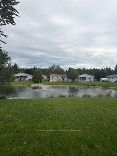 Photo 3 of 22 Indiana Avenue E, Wasaga Beach — HOMEH