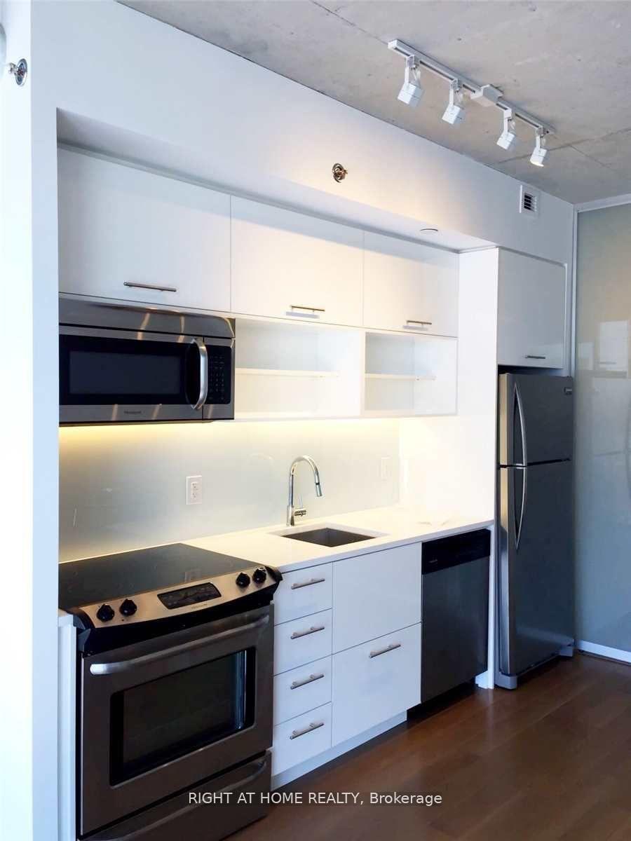 Photo 10 of Unit 502, 32 Trolley Crescent, Toronto, Moss Park — HOMEH
