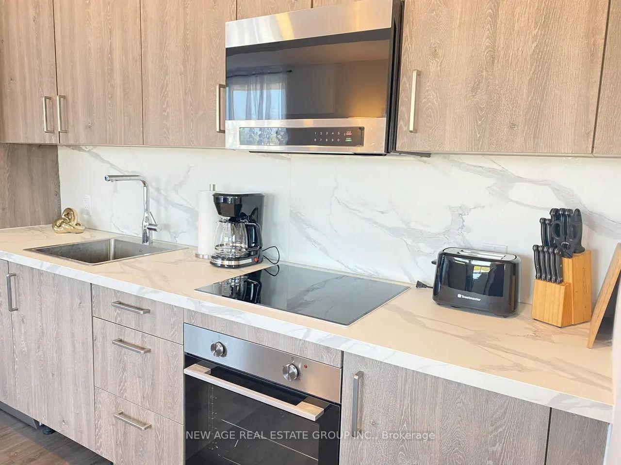 Photo 6 of Unit 201, 7549 Kalar Road, Niagara Falls, Brown — HOMEH